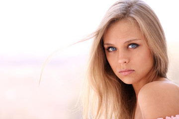 Wall Mural - Closeup portrait of a beautiful young woman