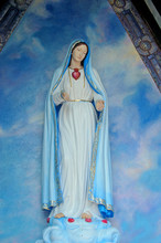 Holy Virgin Mary In A Blue Chapel