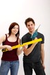 young couple with tools