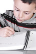© Mehmet Dilsiz - Little Cute Boy Practicing His Writing Skills
