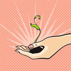 Sprout in a hand