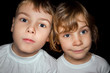 © Pavel Losevsky - boy and little girl in white T-shirts isolated on black