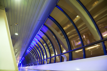 Wall Mural - Long corridor with big windows in modern building at night