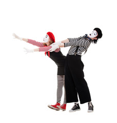 portrait of mimes in striped costumes