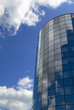 Modern office building and blue sky reflection