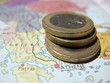 Euro coins on map Greece