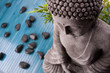 Buddha mit Bambus und Massage Steinen