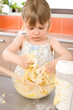 © CandyBox Images - Child baking - little girl kneading dough