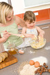 © CandyBox Images - Baking - Woman with child preparing dough