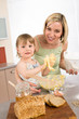 © CandyBox Images - Baking - Woman with child preparing dough