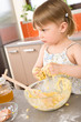 © CandyBox Images - Child baking - little girl kneading dough