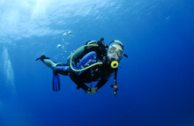 Scuba Diver In Clear Blue Water