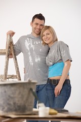 Poster - Portrait of young couple painting