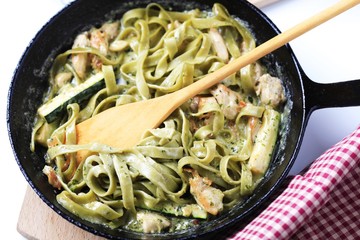 Preparing pasta dish