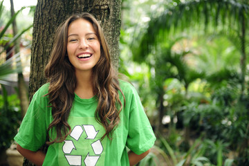 environmental activist  in the forest wearing recycle t-shirt