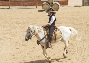 Fototapete - Sheriff riding his horse