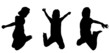 Silhouettes of boy jumping up in the air