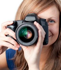 Wall Mural - Smiling woman using a camera