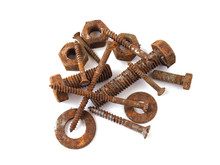 Rusty Nuts, Bolts And Screws On A Plane White Background.
