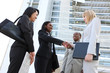 © Stephen Coburn - Diverse Business Team Handshake
