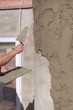 Plastering a wall outside