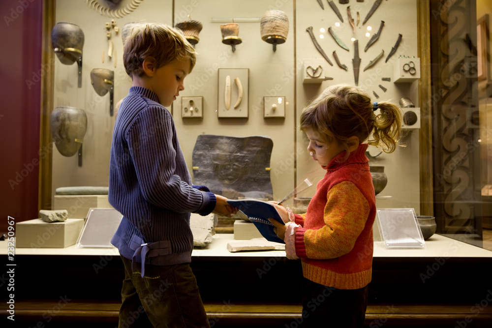 boy and little girl at excursion in historical museum - obrazy, fototapety, plakaty 