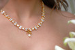 Gold bridal necklace with diamonds and perl