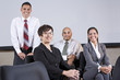 © Kablonk Micro - Mature Hispanic businesswoman leading office team