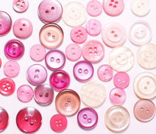 Old Pink Buttons Background
