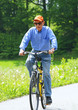 Senior beim Radfahren - Senior with Bike in Nature