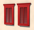 Two red windows in strong summer light