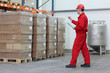 © endostock - worker counting stocks in a company warehouse