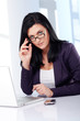 © Günter Menzl - business woman with a pair of glasses