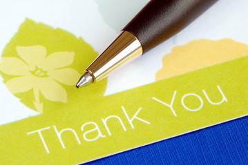 Wall Mural - Write the thank you card isolated on blue