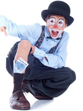 Happy Child Clown With Money In His Socks