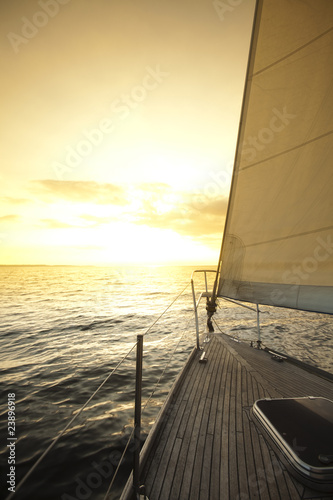 Fototapeta na wymiar Sailing and sunset sky