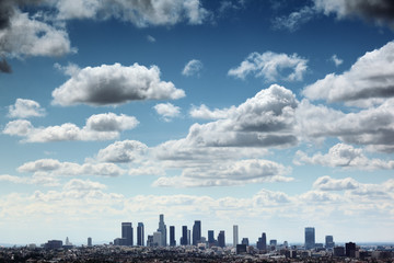 Fototapete - Downtown Los Angeles skyline under blue sky with scenic clouds