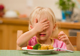 little girl eating lunch