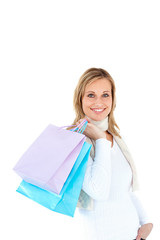 Wall Mural - Handsome woman holding shopping bags