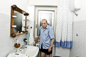 Wall Mural - portrait of elder man in the bathroom