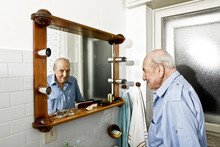 Portrait Of Elder Man In The Bathroom