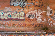 Graffiti On A Brick Wall