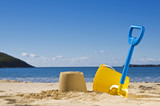 Fototapeta Sypialnia - Spade and bucket at the beach