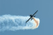 stunt pilot making a sharp aerobatic turn