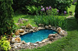 Leinwanddruck Bild - small pond in the garden