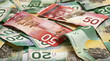 Backgroun made of layed down canadian money