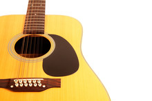 A 12 String Acoustic Guitar On An Isolated White Background
