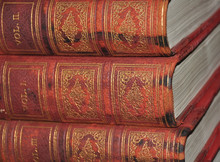 Antique Leather Bound Volumes Of Red And Gilt Lettering