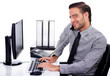 © get4net - Busy professional using telephone while at work
