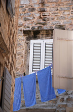 Old Wall, Window And Blue Linen (Italy)